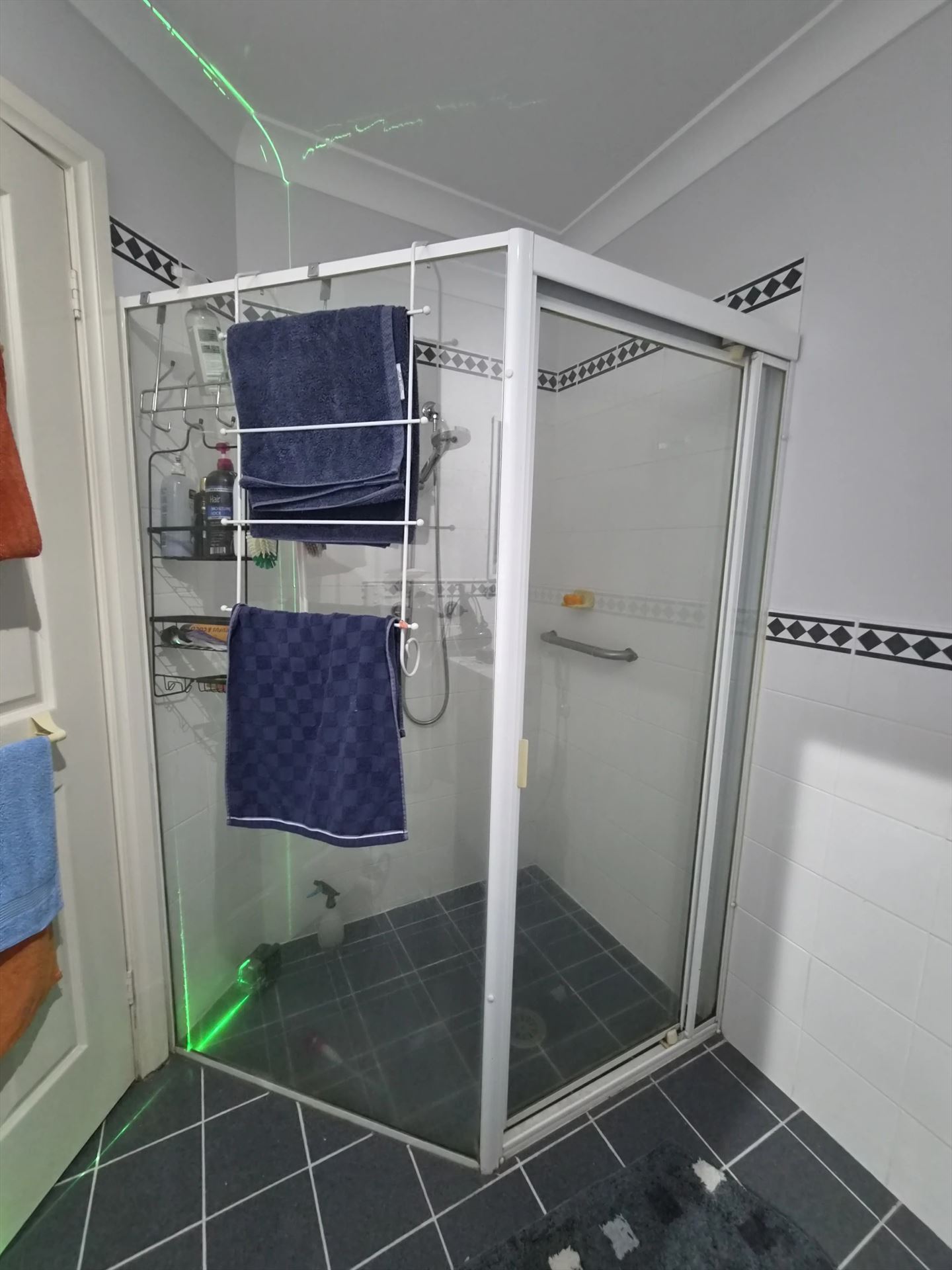 fully shower screen with white hardware installed in Greystanes by Showerland