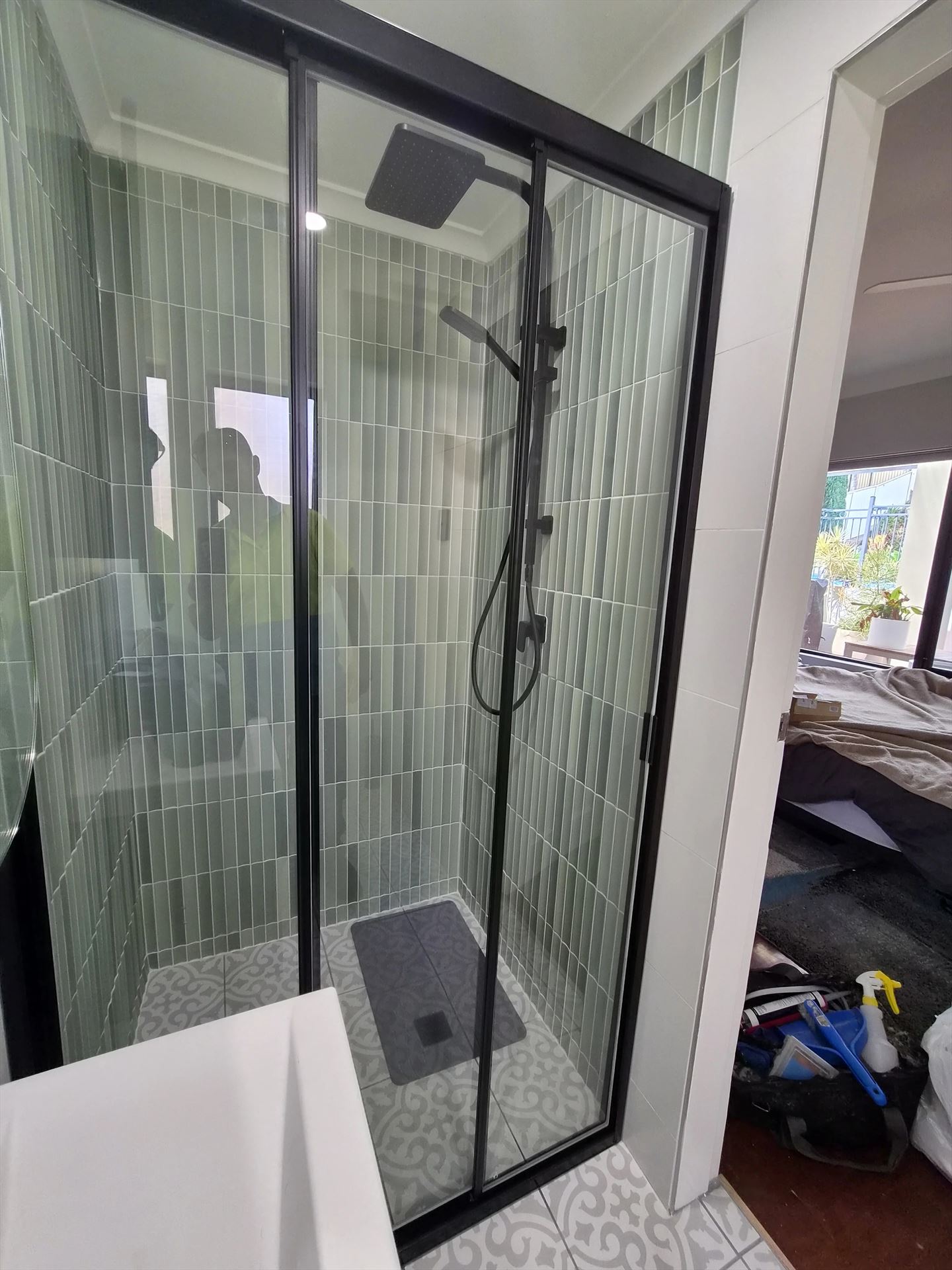 fully shower screen with black hardware installed in Taren Point by Showerland
