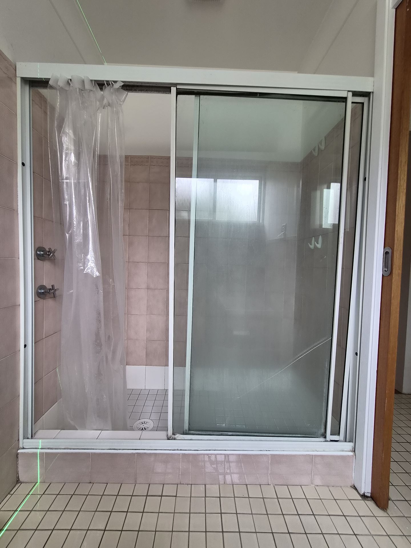 fully shower screen with white hardware installed in Kings Park by Showerland